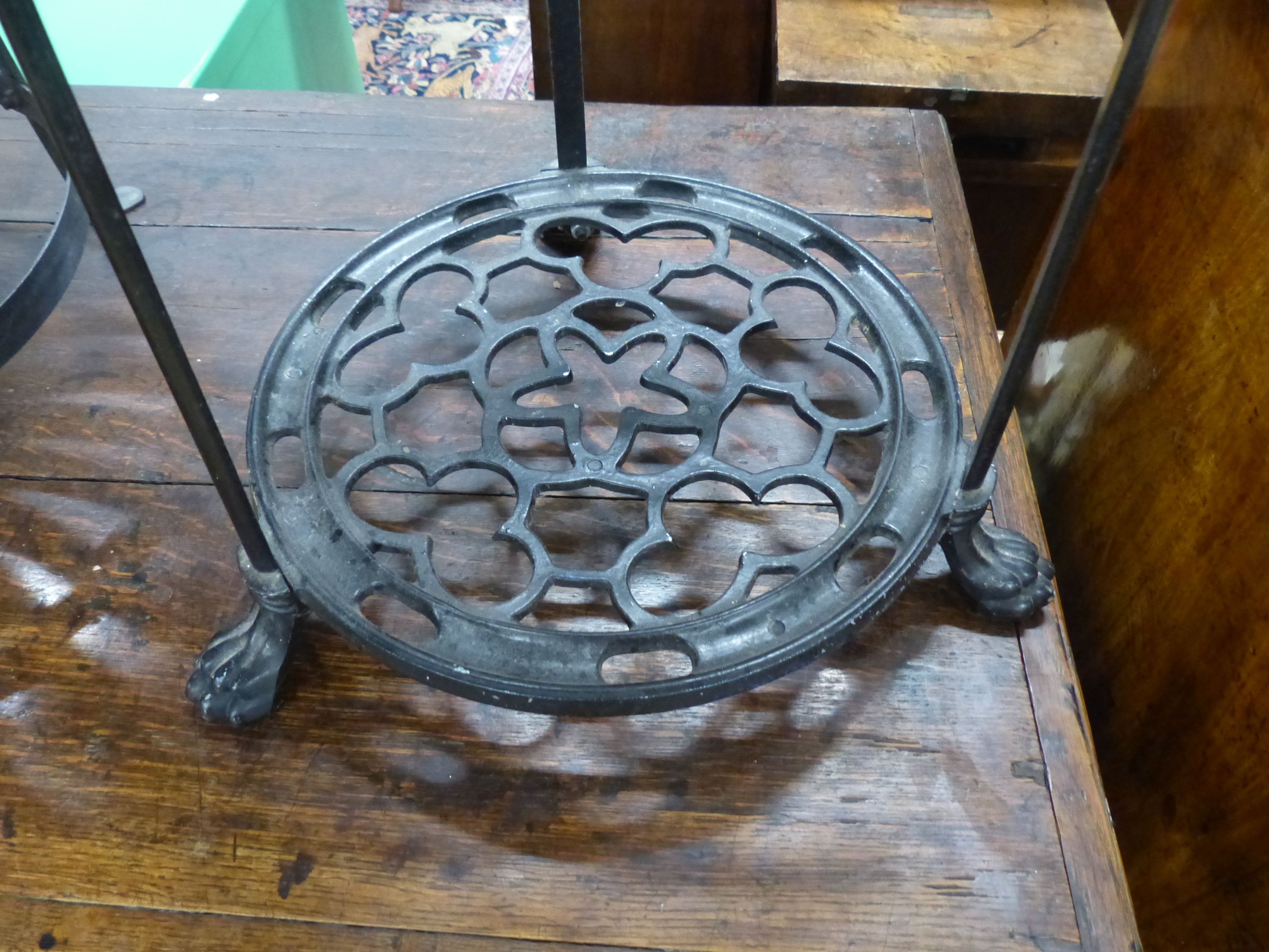 A Victorian style cast metal six tier pot stand, H.126cm